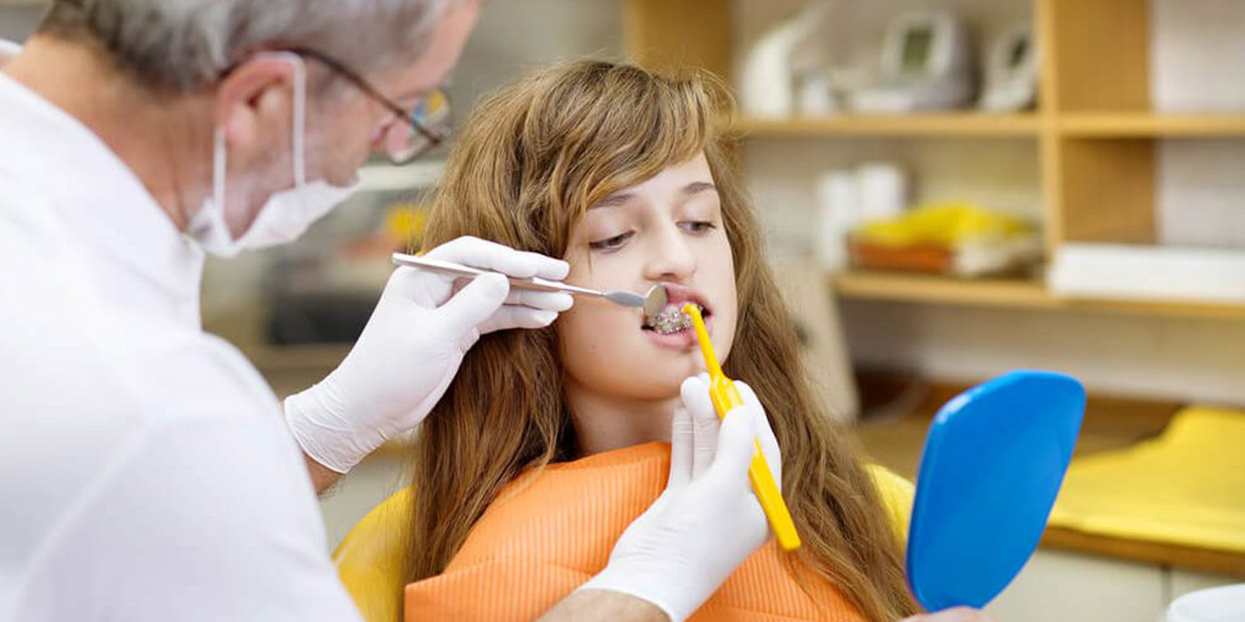 5 tips for effectively cleaning your teeth while wearing braces